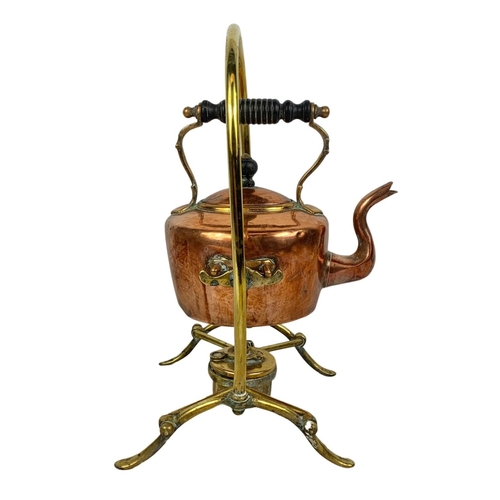 155 - A Victorian copper and brass spirit kettle. 35cm