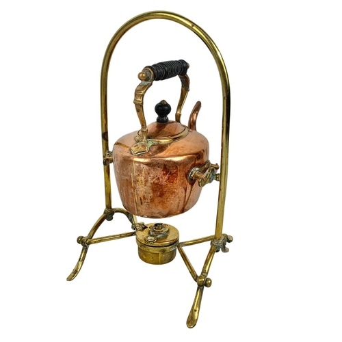 155 - A Victorian copper and brass spirit kettle. 35cm