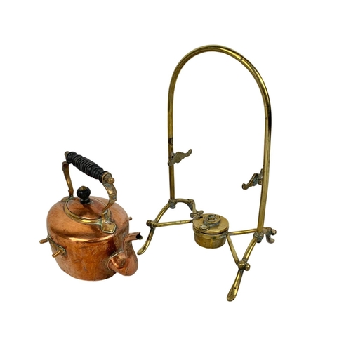 155 - A Victorian copper and brass spirit kettle. 35cm