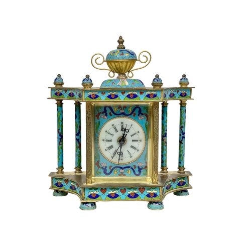 157 - 18th century style cloisonné mantle clock in box. Clock measures 21 x 23cm.