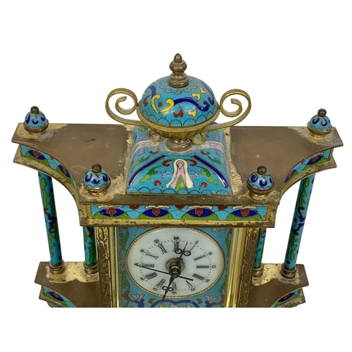 157 - 18th century style cloisonné mantle clock in box. Clock measures 21 x 23cm.