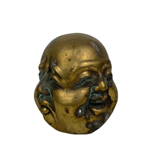 159 - An early 20th century brass 4 face Buddha. Circa 1900-1920. 12cm