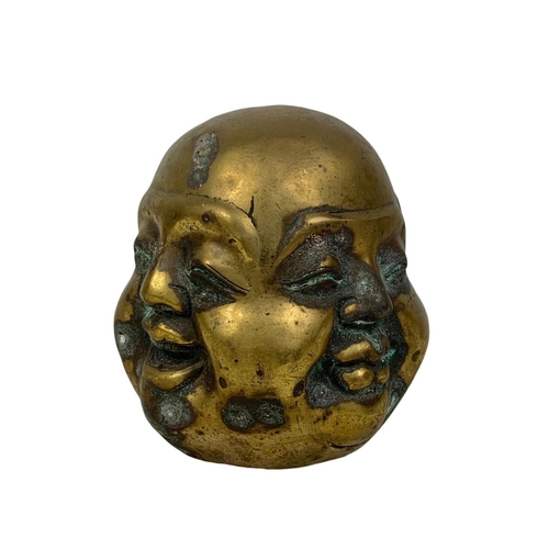 159 - An early 20th century brass 4 face Buddha. Circa 1900-1920. 12cm