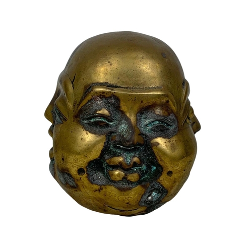 159 - An early 20th century brass 4 face Buddha. Circa 1900-1920. 12cm