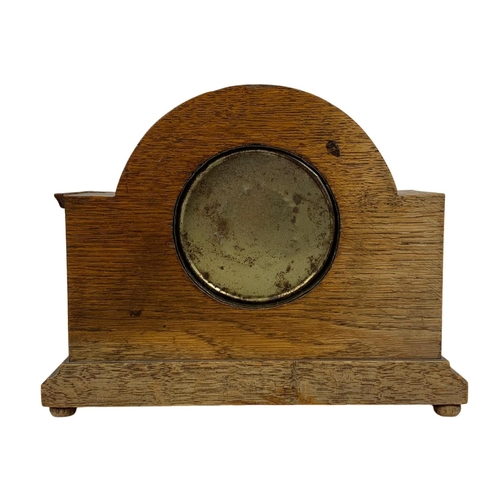 166 - An early 20th century inlaid oak mantle clock. Circa 1920. 24 x 19cm