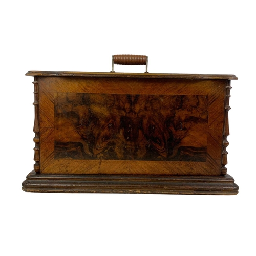 170 - A late Victorian hand turning sewing machine in an inlaid case. With Leo The Lion. Circa 1890/1900. ... 