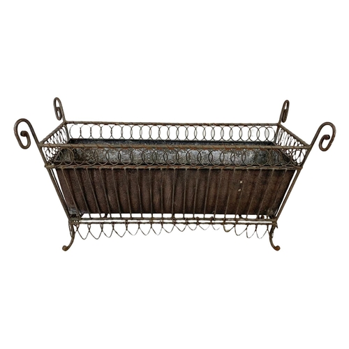 174 - A vintage French 19th century style wrought iron and wire planter. 55.5 x 26 x 29.5cm