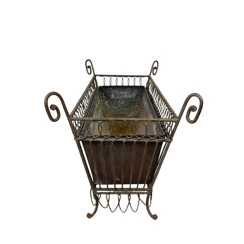 174 - A vintage French 19th century style wrought iron and wire planter. 55.5 x 26 x 29.5cm