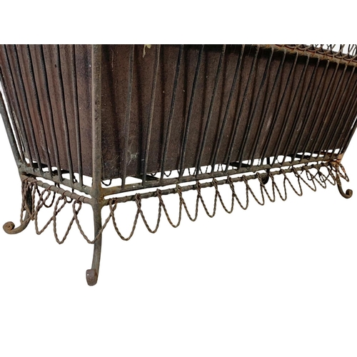 174 - A vintage French 19th century style wrought iron and wire planter. 55.5 x 26 x 29.5cm