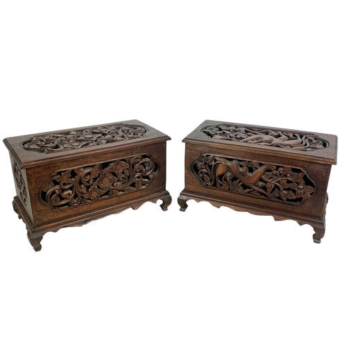 175 - A pair of carved ornate wooden storage boxes. 49 x 25.5 x 29cm.