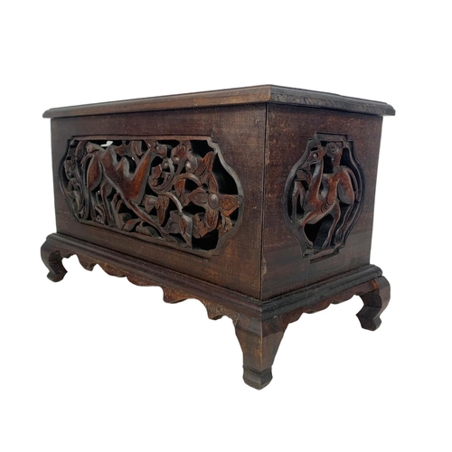 175 - A pair of carved ornate wooden storage boxes. 49 x 25.5 x 29cm.