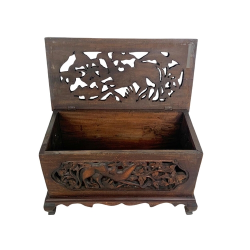 175 - A pair of carved ornate wooden storage boxes. 49 x 25.5 x 29cm.