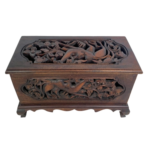 175 - A pair of carved ornate wooden storage boxes. 49 x 25.5 x 29cm.