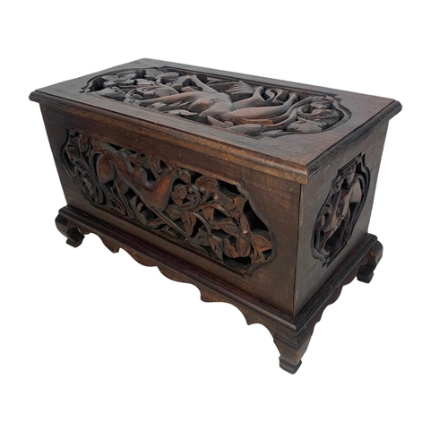 175 - A pair of carved ornate wooden storage boxes. 49 x 25.5 x 29cm.