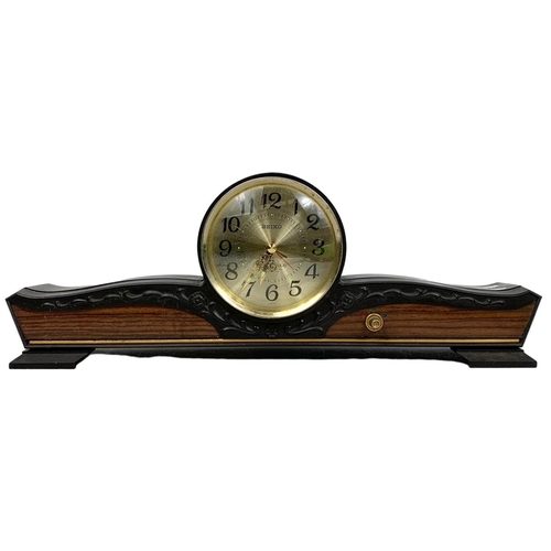 182 - A vintage Genalex mantle clock and a large Seiko mantle clock. Largest 43 x 15cm