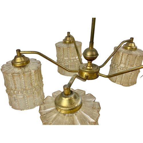 185 - 2 matching vintage brass chandeliers with glass shades. Largest 49 x 51cm