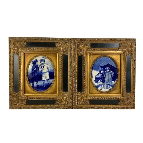 199 - A pair of Carvers & Gilders Picture Makers & Restorers gilt framed blue and white porcelain plaques.... 