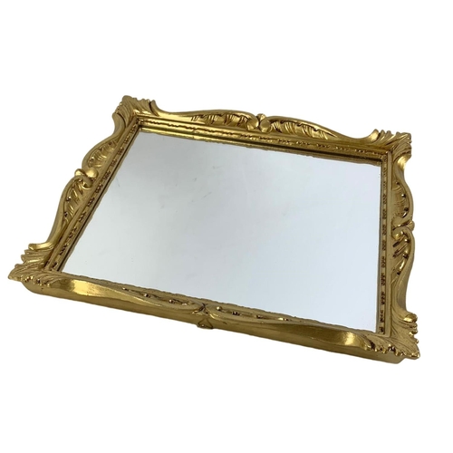 205 - A pair of ornate gilt framed mirrors 26.5 x 31cm