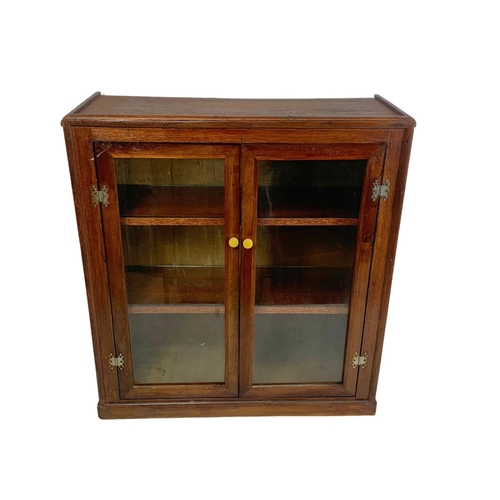 214 - A vintage 2 door cabinet. 63 x 23 x 69cm