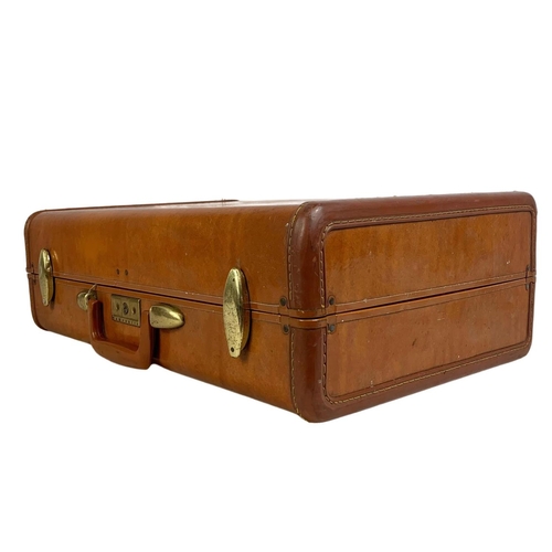 218 - A vintage leather Samsonite luggage case. 54 x 39cm