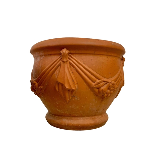 221 - Set of 4 large matching terracotta garden planters. 40 x 32.5cm.