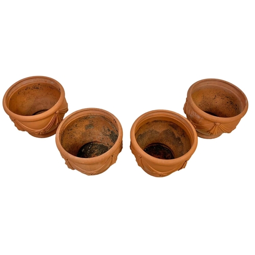 221 - Set of 4 large matching terracotta garden planters. 40 x 32.5cm.