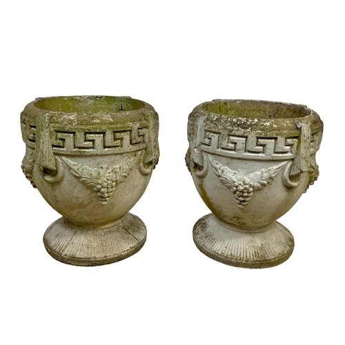 222 - A pair of large concrete garden planters with Greek Key decoration. 40 x 43.5cm.