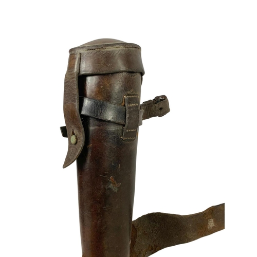 234 - A Late 19th/early 20th century leather saddle hip hunting flask holder.  24cm.