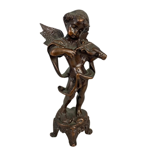 237 - 4 vintage brass cherubs and an ornate brass easel. Cherubs measure 14.5cm. 36cm.