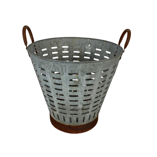 241 - A 1950’s French galvanised olive basket. 43 x 45cm.