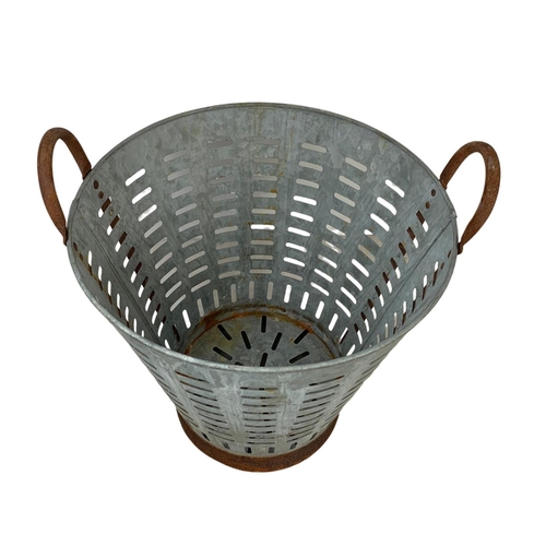 241 - A 1950’s French galvanised olive basket. 43 x 45cm.