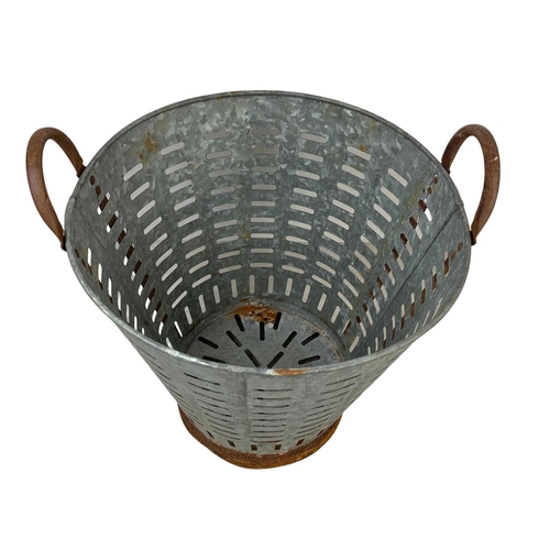 242 - A 1950’s French galvanised olive basket. 42 x 44cm.