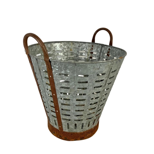 242 - A 1950’s French galvanised olive basket. 42 x 44cm.