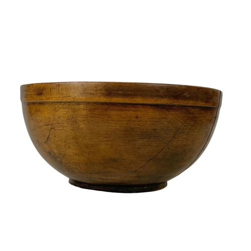 251 - A late 19th century butternut bowl. 30 x 14.5cm.