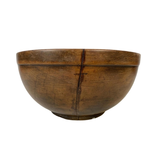 251 - A late 19th century butternut bowl. 30 x 14.5cm.