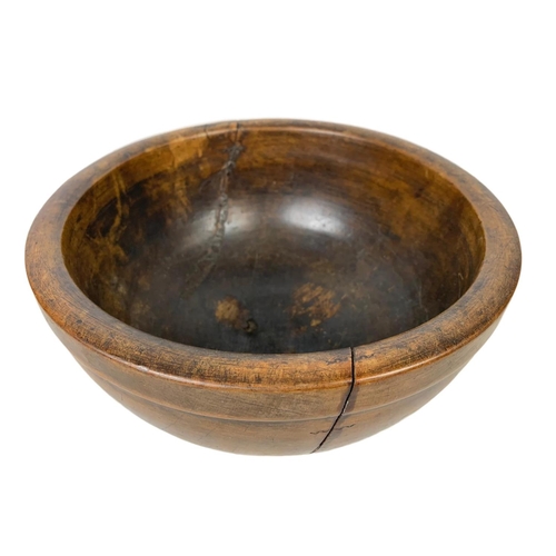 251 - A late 19th century butternut bowl. 30 x 14.5cm.