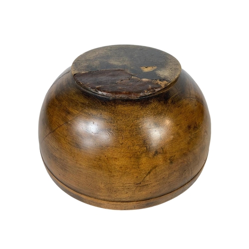 251 - A late 19th century butternut bowl. 30 x 14.5cm.