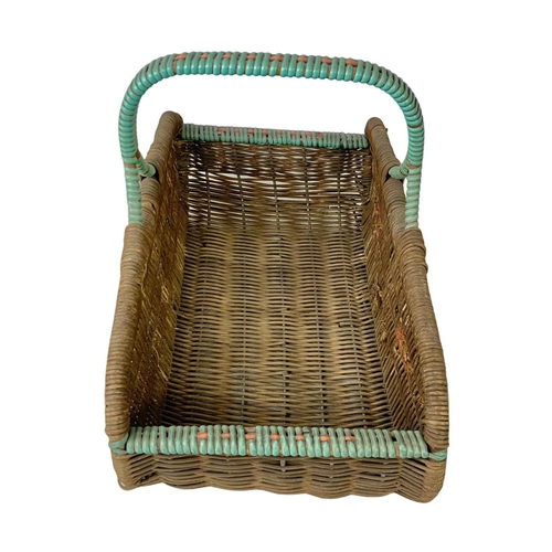 253 - A 1930’s wicker basket. 37 x 23 x 31cm