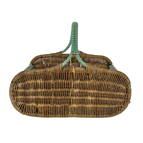 253 - A 1930’s wicker basket. 37 x 23 x 31cm