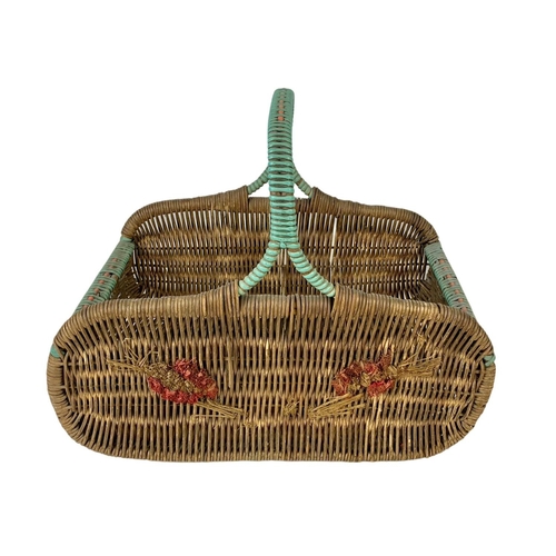 253 - A 1930’s wicker basket. 37 x 23 x 31cm