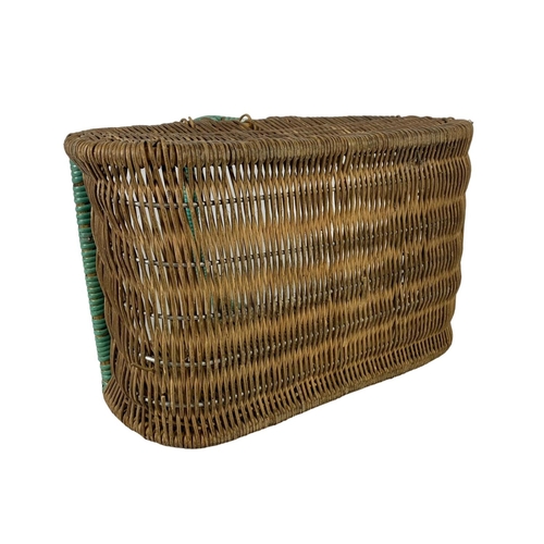 253 - A 1930’s wicker basket. 37 x 23 x 31cm