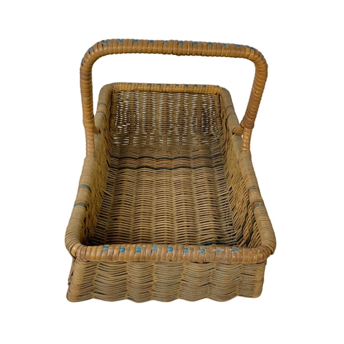 254 - A 1930’s wicker basket. 38 x 24 x 29cm