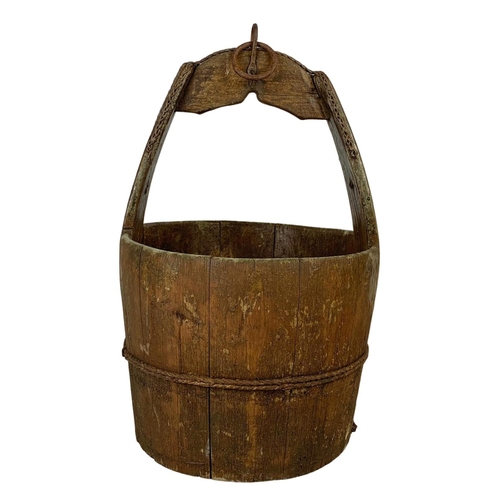 255 - An early 20th century wooden well bucket. Circa 1900, 45cm