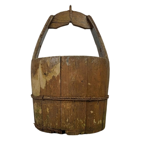 255 - An early 20th century wooden well bucket. Circa 1900, 45cm