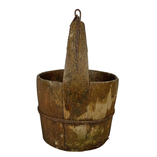 255 - An early 20th century wooden well bucket. Circa 1900, 45cm