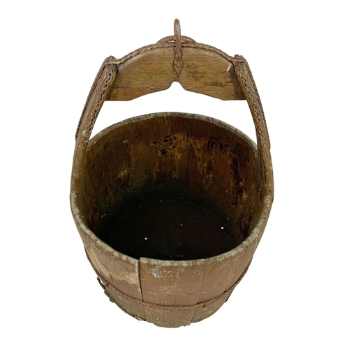 255 - An early 20th century wooden well bucket. Circa 1900, 45cm