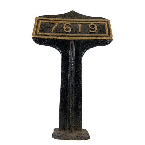 258 - A large late 19th century cast iron railway marker. 63cm.