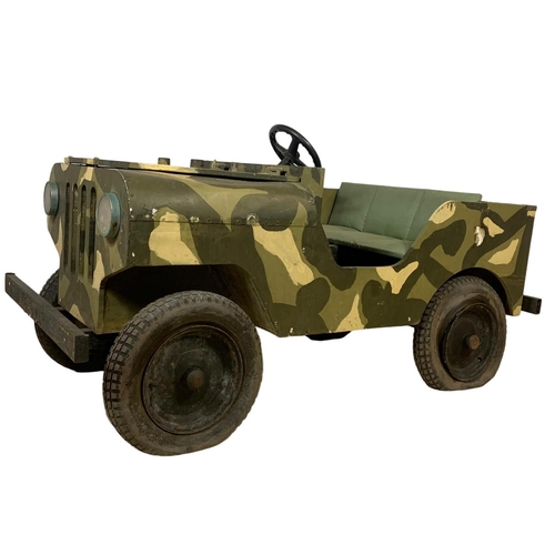 267 - A large vintage battery operated childs army jeep. 144 x 65 x 70cm.