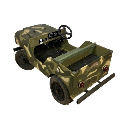 267 - A large vintage battery operated childs army jeep. 144 x 65 x 70cm.