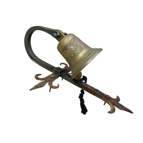 28 - Victorian brass and iron wall hanging bell. 30 x 48cm